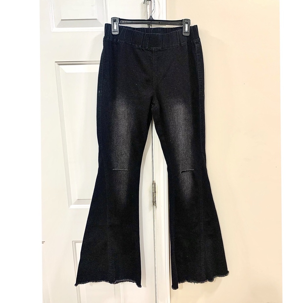 Black Stretch Denim Bell Bottom Jeans.